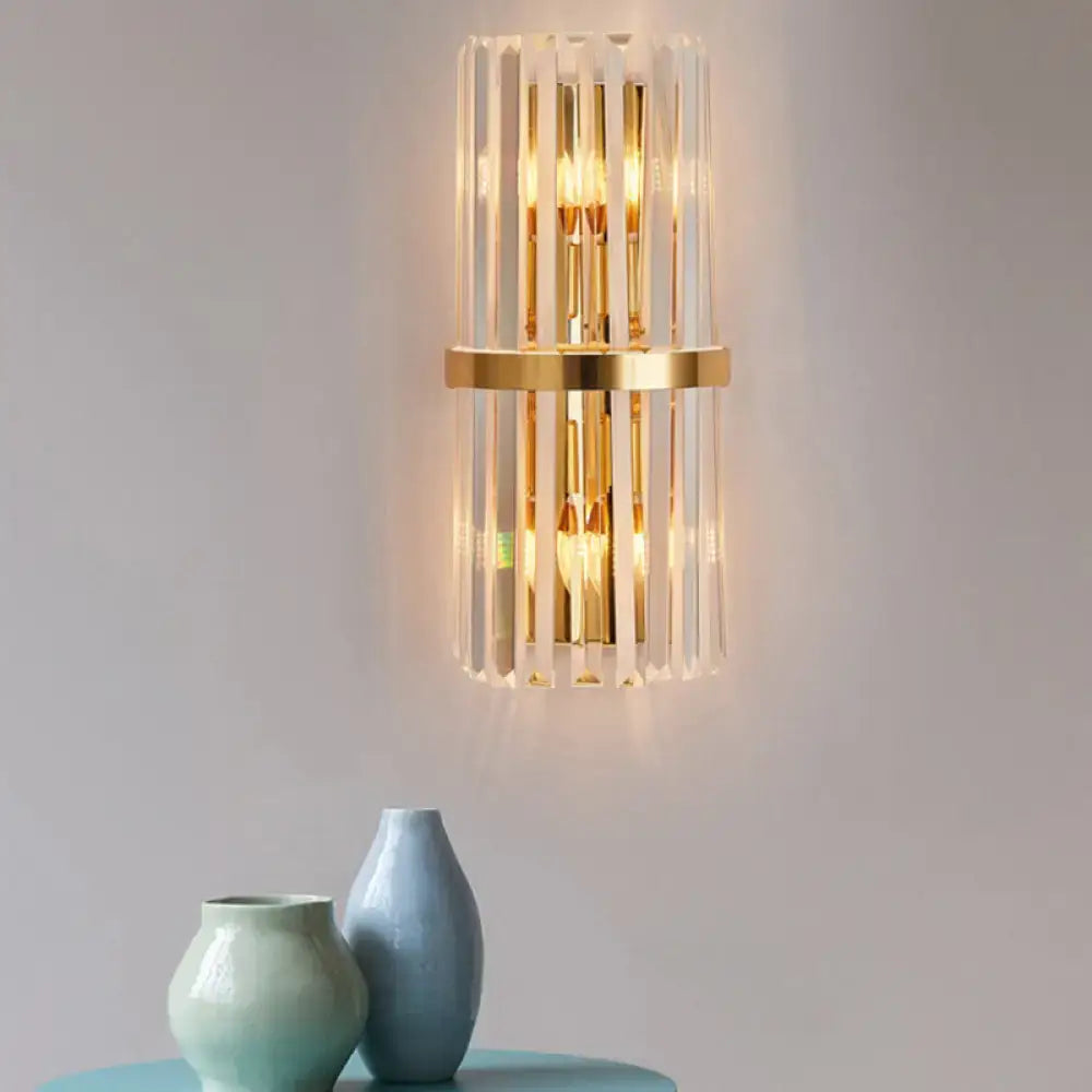 Gold crystal prism wall sconce by Decorbites, glass bars, warm glow on Tampa Home & Garden Store