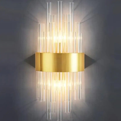 Elegant gold crystal prism wall sconce light with glass prisms around a gold band Decorbites on Tampa Home & Garden Store