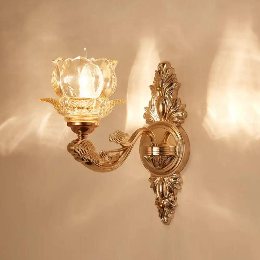 Elegant gold scrolled arm wall sconce with crystal shade by Decorbites for bedroom on Tampa Home & Garden Store