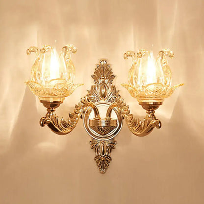 Elegant gold two-light wall sconce with scrolled arms and crystal tulip shades Decorbites on Tampa Home & Garden Store