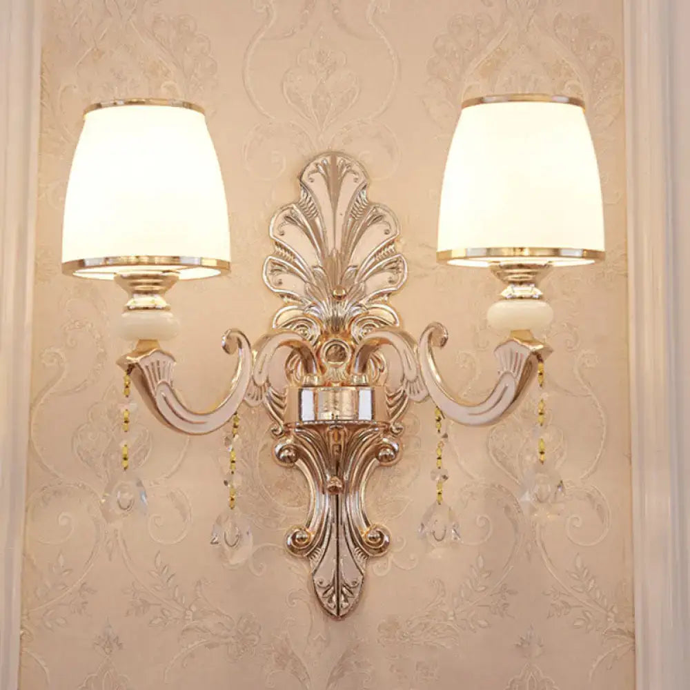Elegant gold scrolled arm wall sconce with crystal accents and white shade, 2-light on Tampa Home & Garden Store