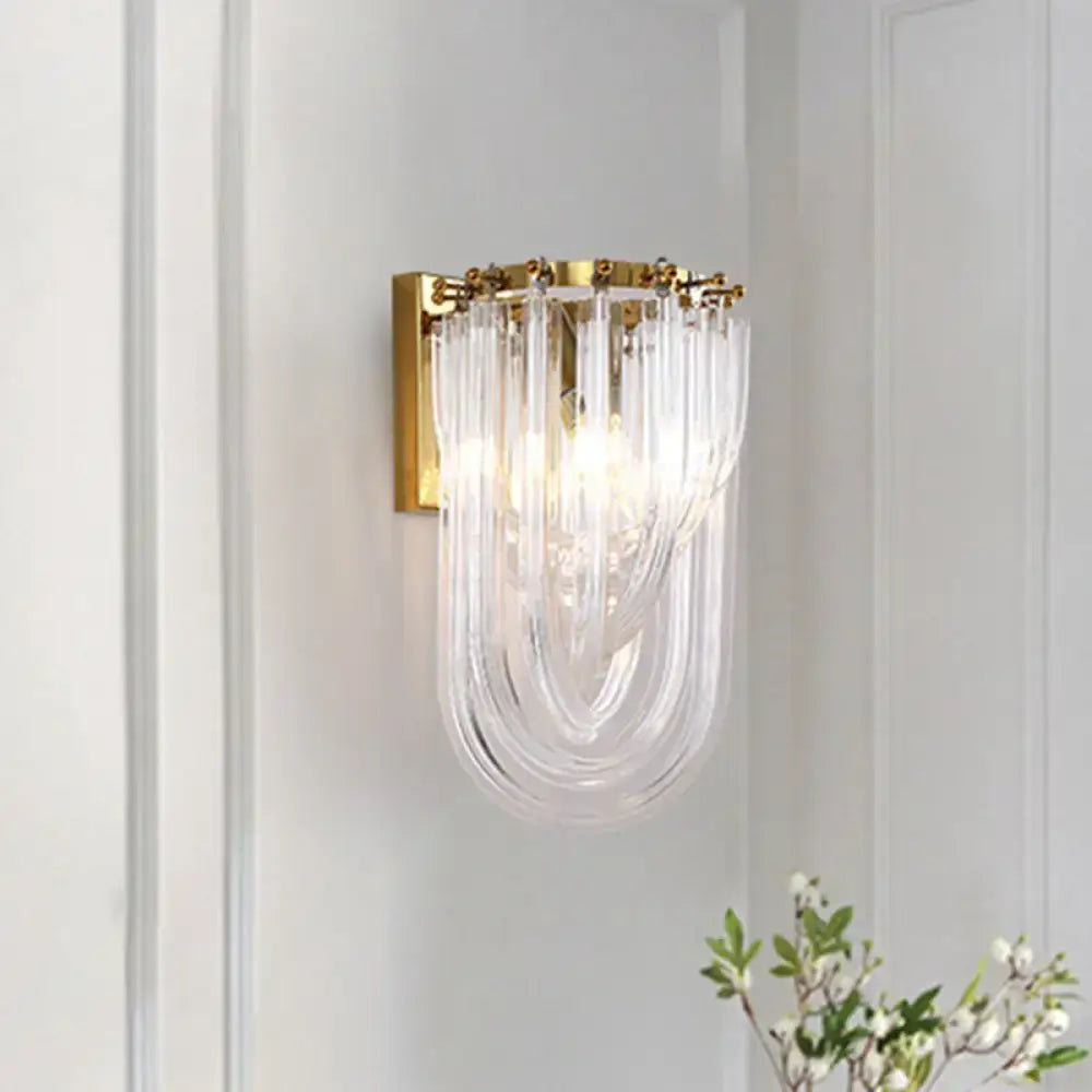 Gold Crystal Twisted Adjustable Wall Lamp with crystal strands on brass backplate on Tampa Home & Garden Store