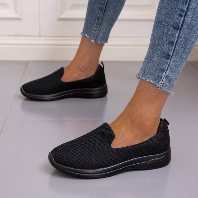 Stevvex black mesh slip-on espadrille sneakers for women, breathable knit upper pair shown on Tampa Home & Garden Store