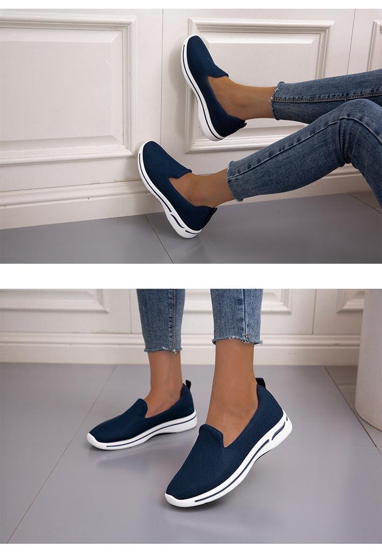 Navy mesh slip-on sneakers pair for women with breathable knit upper and white sole on Tampa Home & Garden Store