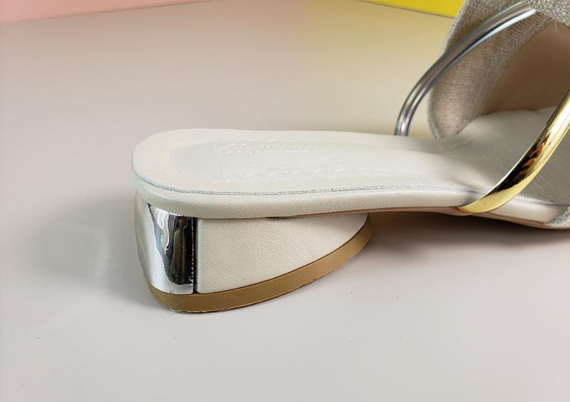 Stevvex white backless low-heel slide slipper with metallic gold strap and chrome heel detail on Tampa Home & Garden Store