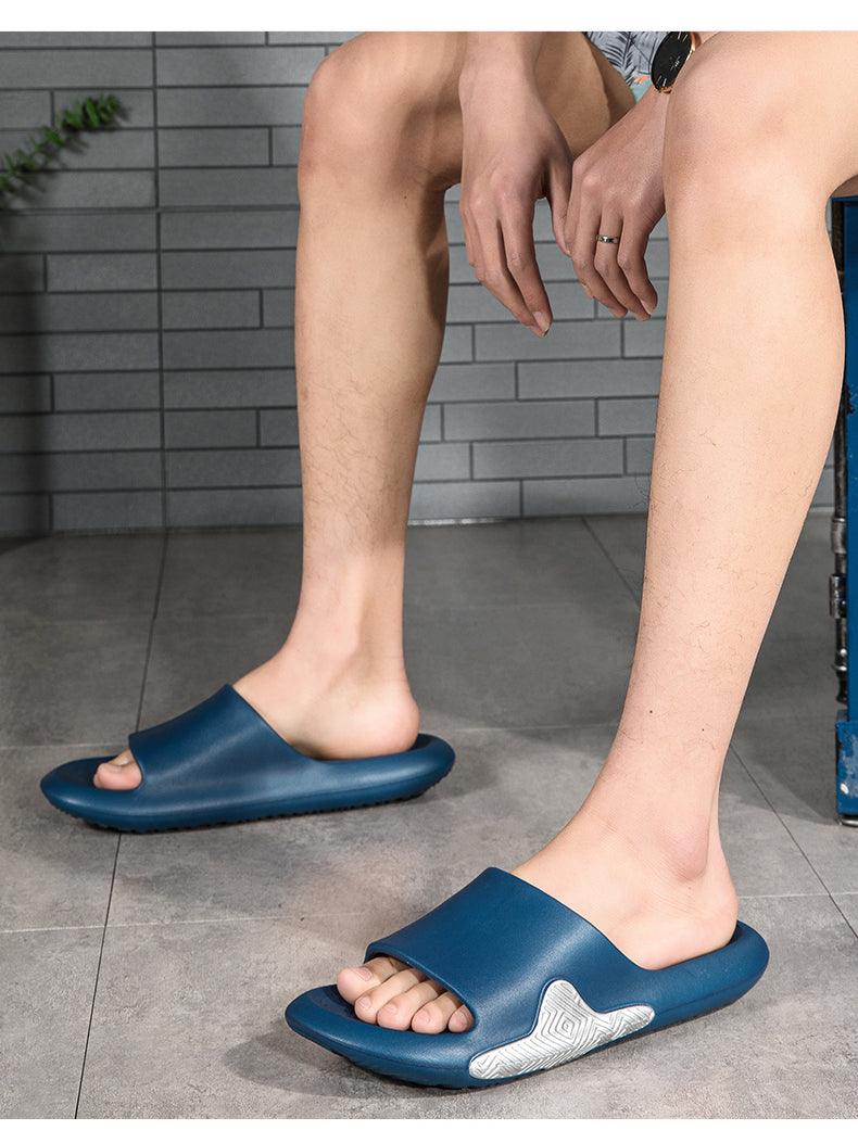 Men's blue EVA massage foam slides with anti-slip sole, pair on Tampa Home & Garden Store