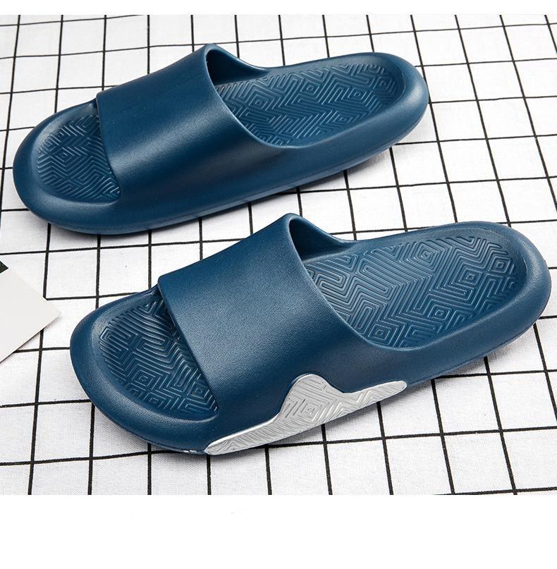 Blue unisex slide slippers with wide strap, textured footbed, lightweight EVA for home use on Tampa Home & Garden Store