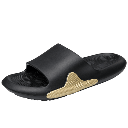 Men's black EVA slide slipper with wide strap, textured footbed, and gold side accent on Tampa Home & Garden Store