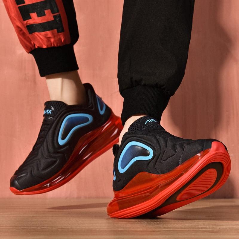 Stevvex athletic shoes black mesh with blue accents and red translucent sole on Tampa Home & Garden Store