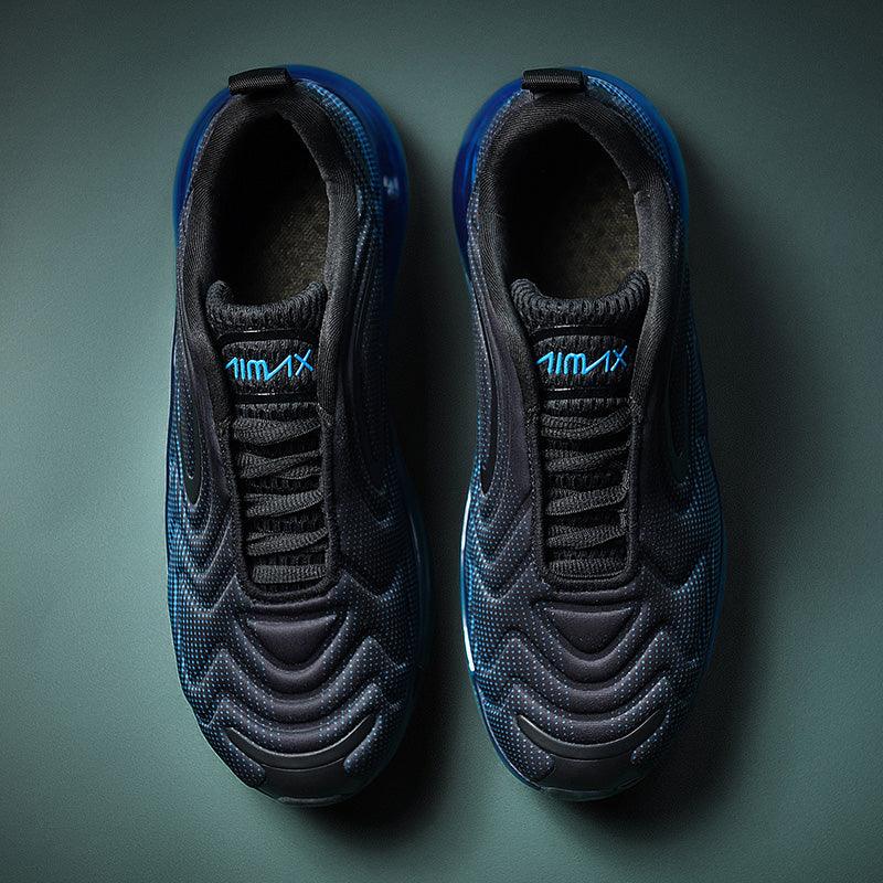 Stevvex athletic shoes pair, dark blue breathable mesh upper with cyan accents on Tampa Home & Garden Store