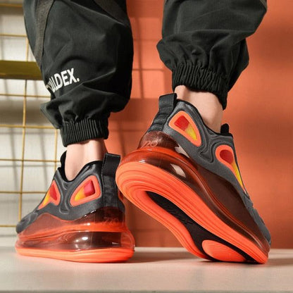 Athletic sneakers Stevvex men's running shoes with gray mesh upper and orange outsole on Tampa Home & Garden Store