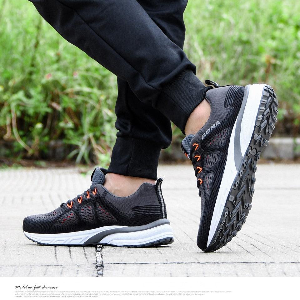 Stevvex sneakers black with orange laces, breathable running shoes with non-slip grip on Tampa Home & Garden Store