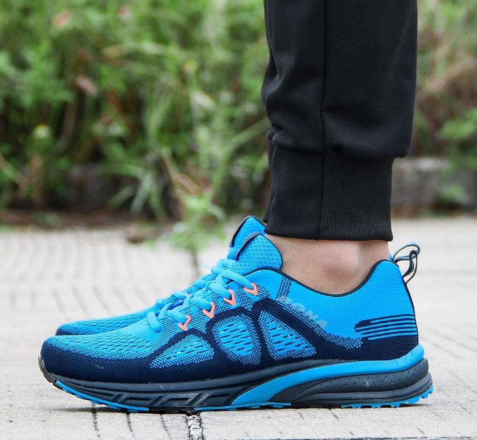 Stevvex blue mesh running sneakers with orange eyelets lightweight breathable shoes on Tampa Home & Garden Store