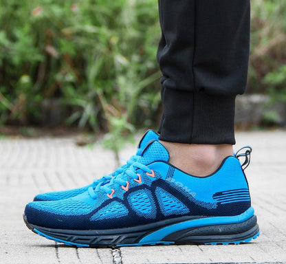 Stevvex blue mesh running sneakers with orange eyelets lightweight breathable shoes on Tampa Home & Garden Store