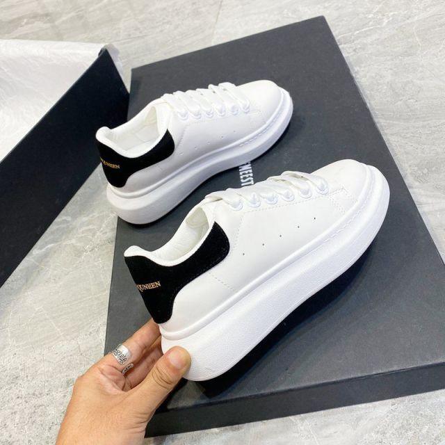 Stevvex men's white leather sneakers with black heel tab and platform sole, casual sporty pair on Tampa Home & Garden Store