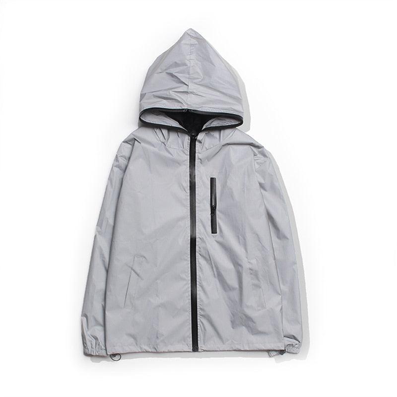 Stevvex hooded windbreaker in light gray reflective fabric, full-zip front with chest pocket on Tampa Home & Garden Store