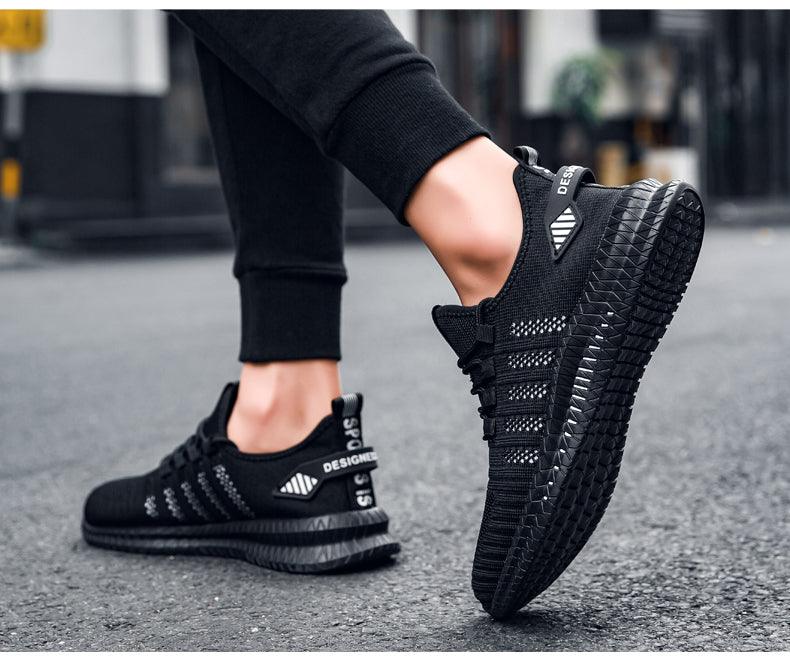 Stevvex Mens Sneakers pair in black with breathable knit upper and non-slip outsole on Tampa Home & Garden Store