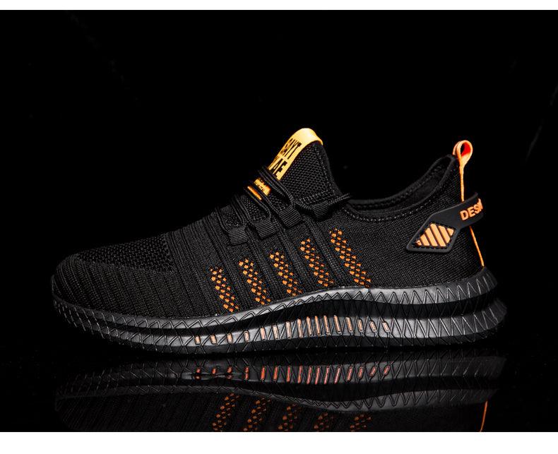 Stevvex men's black breathable running sneakers with orange accents and non-slip outsole on Tampa Home & Garden Store