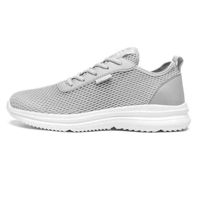 Stevvex men's grey breathable mesh sneakers with white sole and lightweight non-slip outsole on Tampa Home & Garden Store
