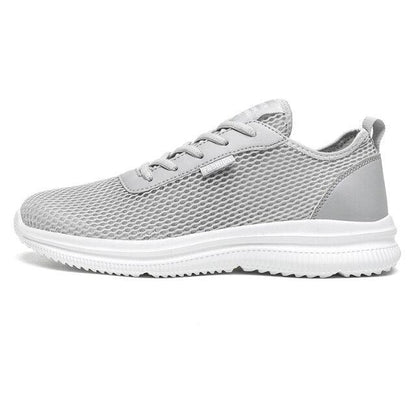 Stevvex men's grey breathable mesh sneakers with white sole and lightweight non-slip outsole on Tampa Home & Garden Store