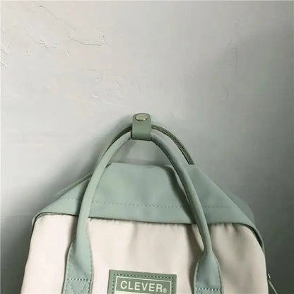 Stevvex nylon candy-color waterproof school backpack mint top white bottom CLEVER patch on Tampa Home & Garden Store