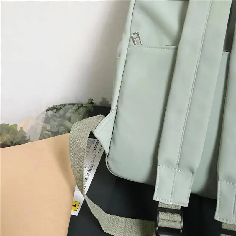 Stevvex mint green nylon school backpack with front pocket and beige padded strap on Tampa Home & Garden Store