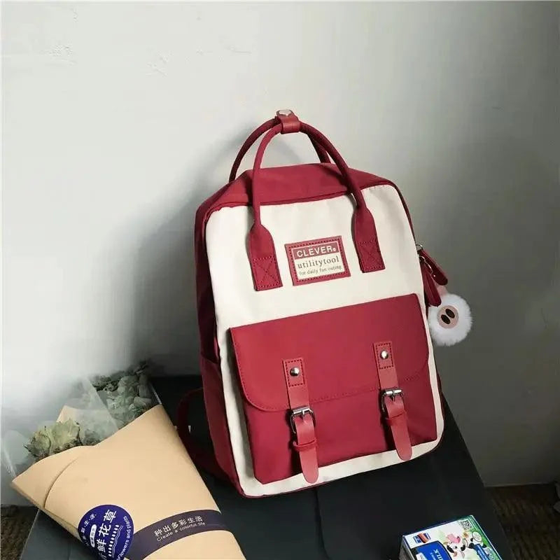 Stevvex nylon school backpack candy color patchwork red and cream, front pocket with buckles on Tampa Home & Garden Store
