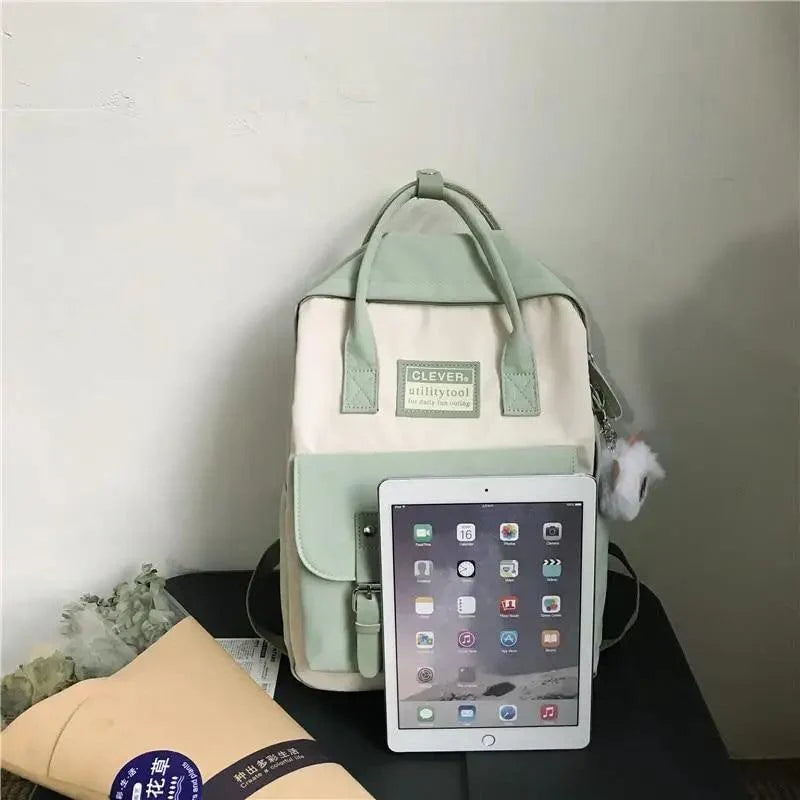 Nylon candy-color waterproof school backpack in mint cream patchwork with front pocket on Tampa Home & Garden Store