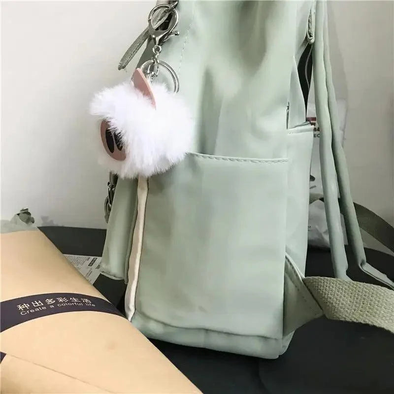 Stevvex elegant nylon waterproof school backpack mint green with fluffy white pom-pom keychain on Tampa Home & Garden Store