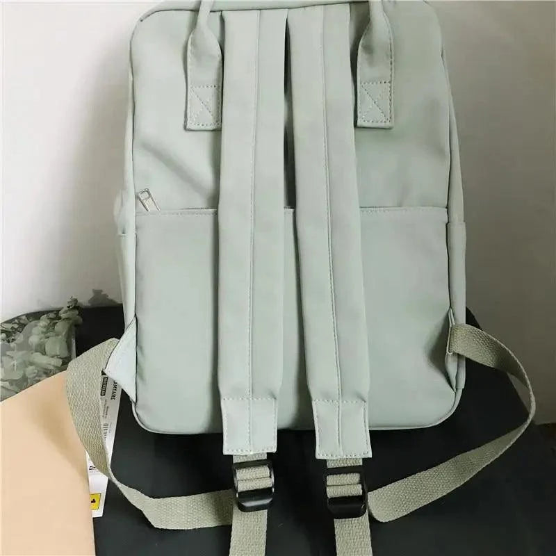 Stevvex nylon candy waterproof school backpack back view with padded straps mint green on Tampa Home & Garden Store