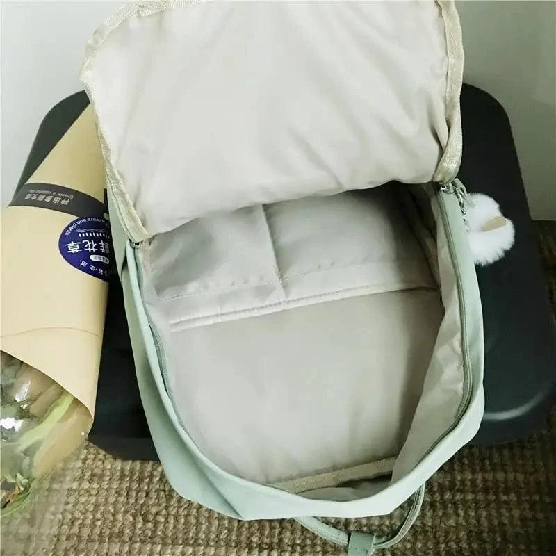 Elegant nylon candy-color waterproof school backpack by Stevvex in light mint with inner pocket on Tampa Home & Garden Store