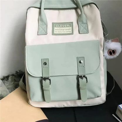 Stevvex nylon school backpack with mint front pocket, pink body and buckle straps ALU70355UZQ on Tampa Home & Garden Store