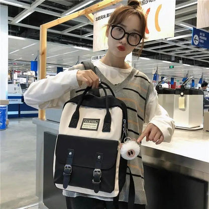 Stevvex nylon candy color waterproof school backpack with cream body and black front, dual buckles on Tampa Home & Garden Store