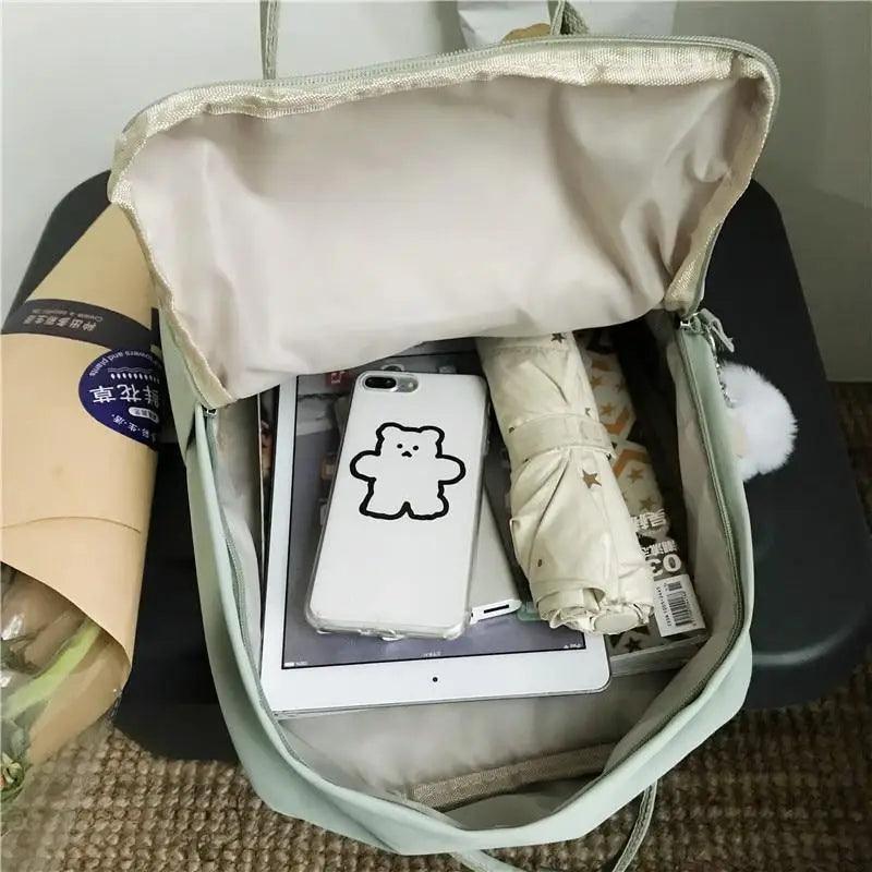 Stevvex nylon school backpack mint green waterproof patchwork, open to show tablet and phone on Tampa Home & Garden Store