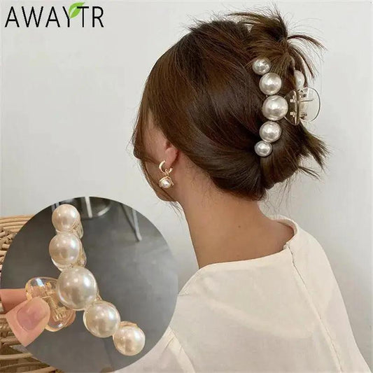 Pearl hair claw clip with large white acrylic pearls, AWAYTR logo visible on bun on Tampa Home & Garden Store