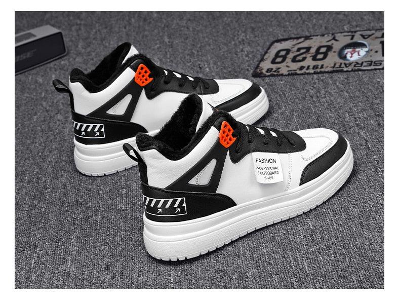 Stevvex sneakers pair, white/black leather upper, orange eyelets, high-top platform lace-up on Tampa Home & Garden Store