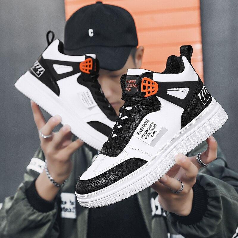Stevvex leather high-top platform sneakers pair in black and white with orange eyelets on Tampa Home & Garden Store