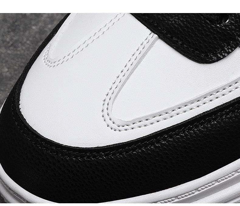 Stevvex Elegant Sport Men's Sneaker in white and black leather with bold contrast stitching on Tampa Home & Garden Store