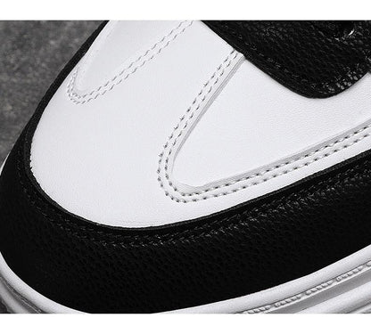 Stevvex Elegant Sport Men's Sneaker in white and black leather with bold contrast stitching on Tampa Home & Garden Store