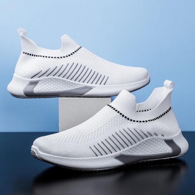 Stevvex Sneakers white mesh slip-on running shoes with black accents pair on Tampa Home & Garden Store