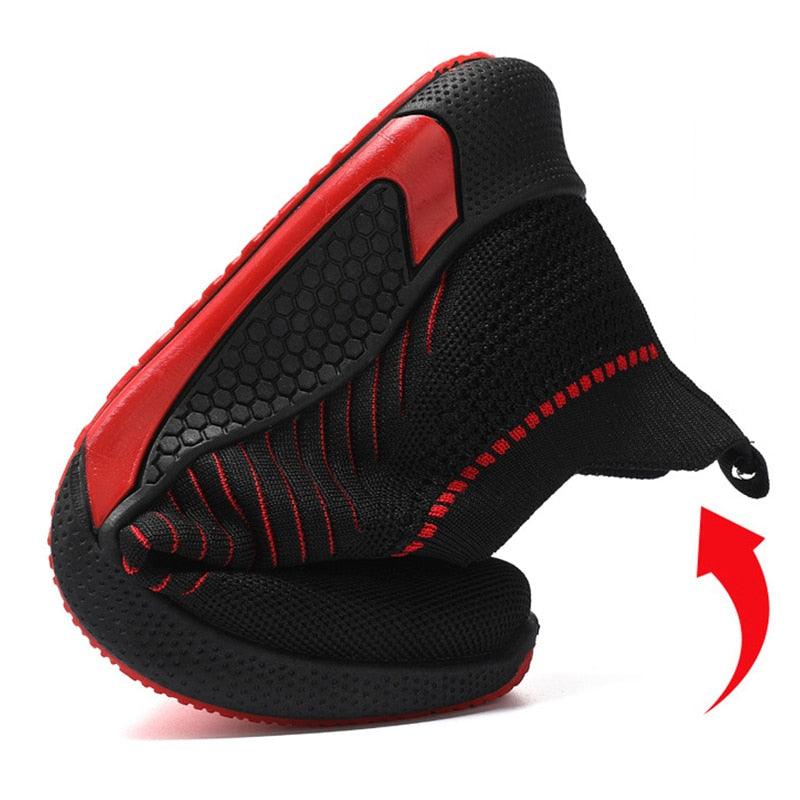 Mens running sneakers with black mesh upper and red sole accents on Tampa Home & Garden Store