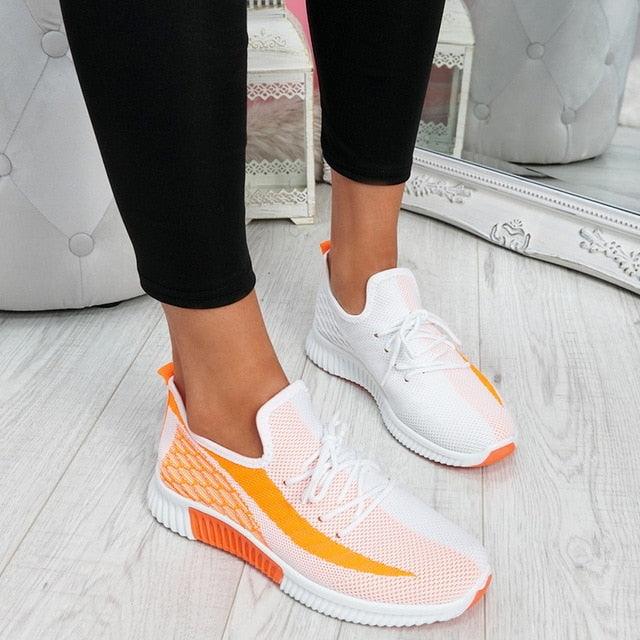 Stevvex women's mesh lace-up sneakers with orange accents and white outsole on Tampa Home & Garden Store