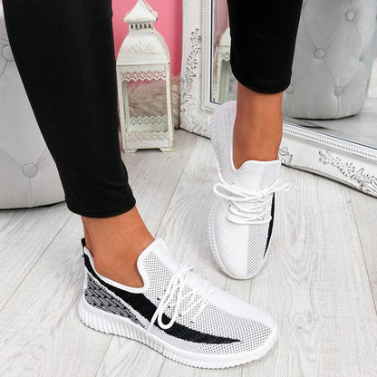 Stevvex women's mesh sneakers pair white with black accents, lace-up, round toe, breathable on Tampa Home & Garden Store