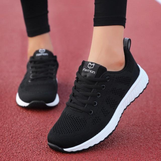 Stevvex Elegant Sport Womens Sneakers black mesh lace-up with white sole on track surface on Tampa Home & Garden Store