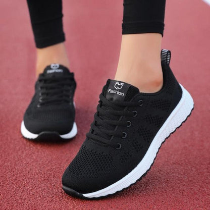 Stevvex Elegant Sport Womens Sneakers black mesh lace-up with white sole on track surface on Tampa Home & Garden Store