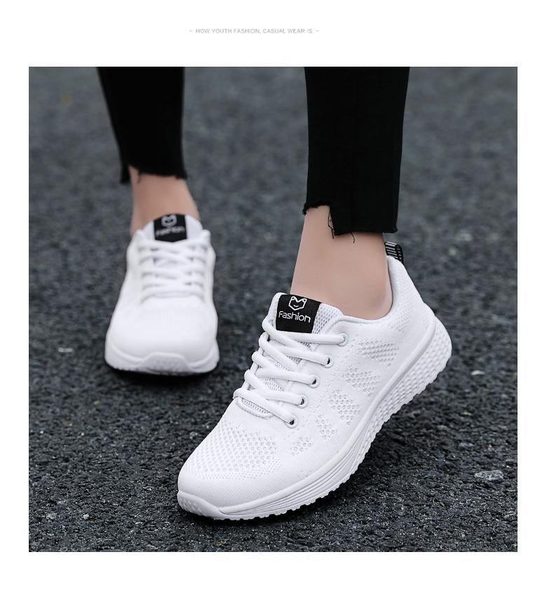 Stevvex white mesh athletic sneakers, lace-up, lightweight pair with non-slip sole on Tampa Home & Garden Store