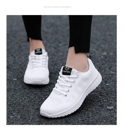 Stevvex white mesh athletic sneakers, lace-up, lightweight pair with non-slip sole on Tampa Home & Garden Store