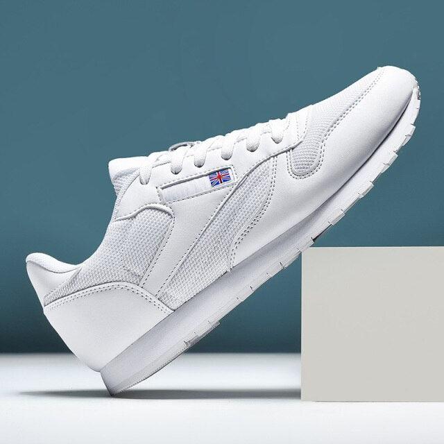 Stevvex white leather sneakers with breathable mesh upper, lace-up casual athletic trainer on Tampa Home & Garden Store