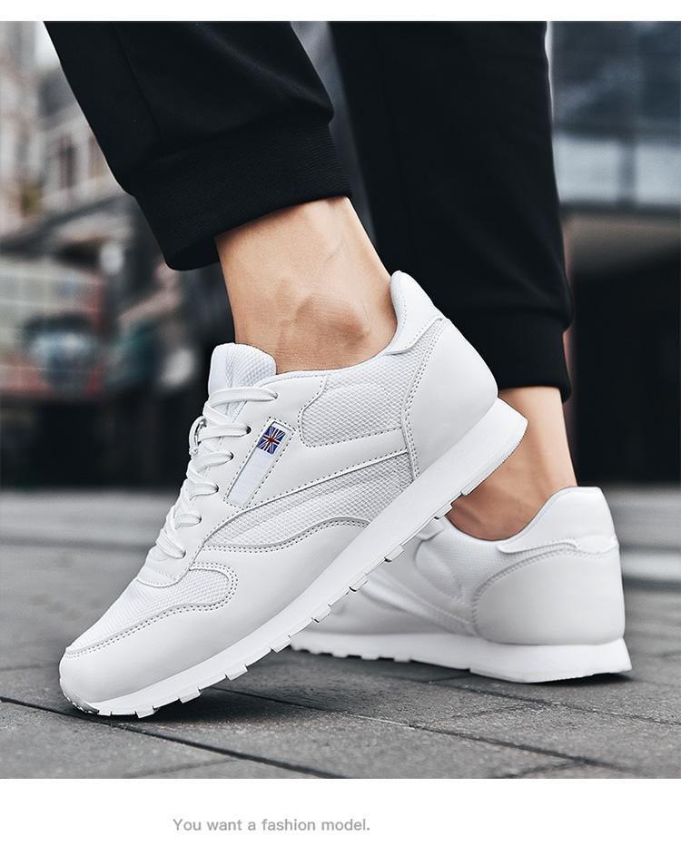 Pair of white Stevvex sneakers with leather upper and mesh panels, lace-up trainers on Tampa Home & Garden Store