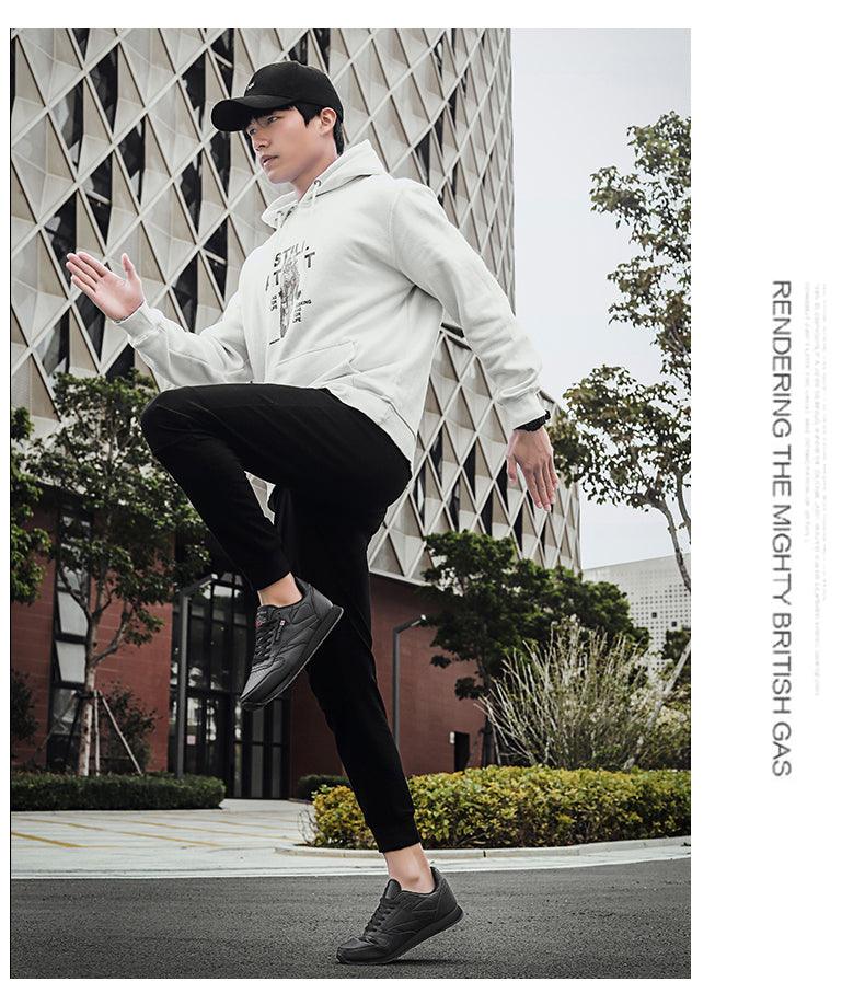 Stevvex white leather sneakers with gray accents, breathable mesh, lace-up athletic trainer on Tampa Home & Garden Store